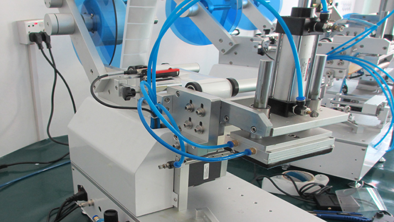 吸嘴袋塑膠袋貼標機半自動平面