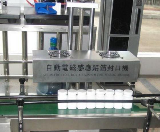 aluminum foil sealing machine 箔感應.jpg
