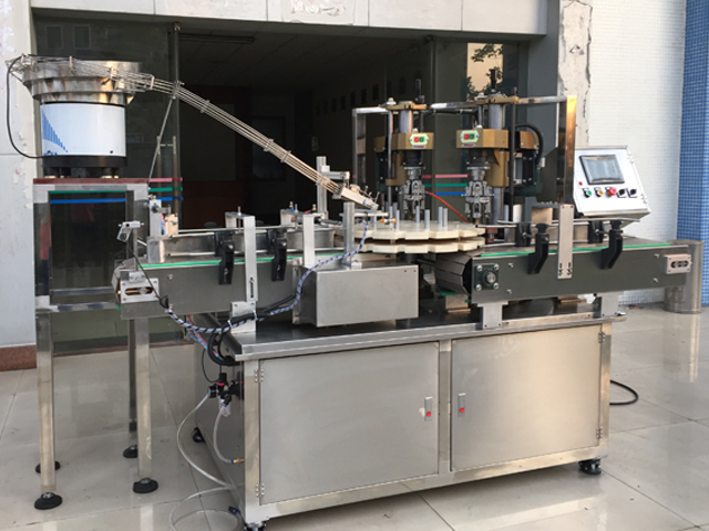 capping machine with 2 capping heads 半自動旋蓋機設備.jpg