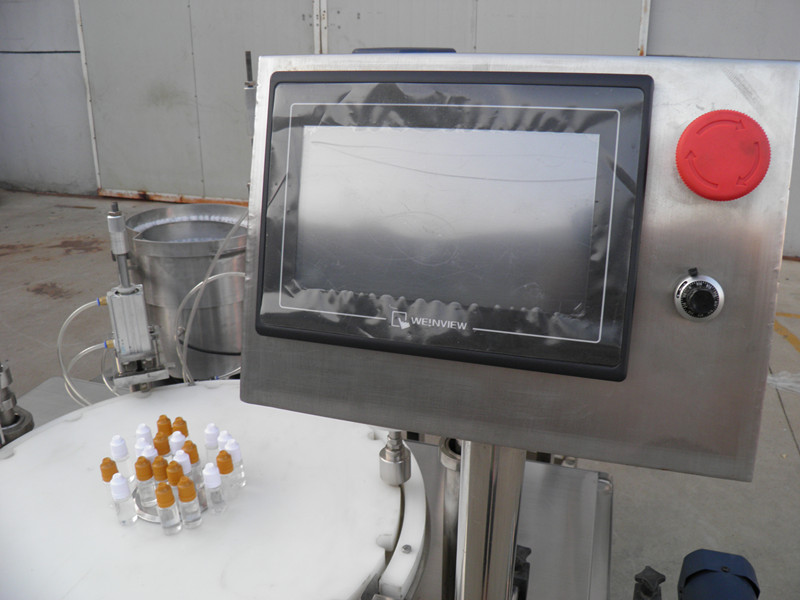 filling plugging capping labeling production line E液PLC瓶灌裝旋蓋貼標.jpg